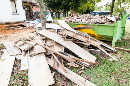 Crew sorting items for reuse at a Woolwich house clearance job